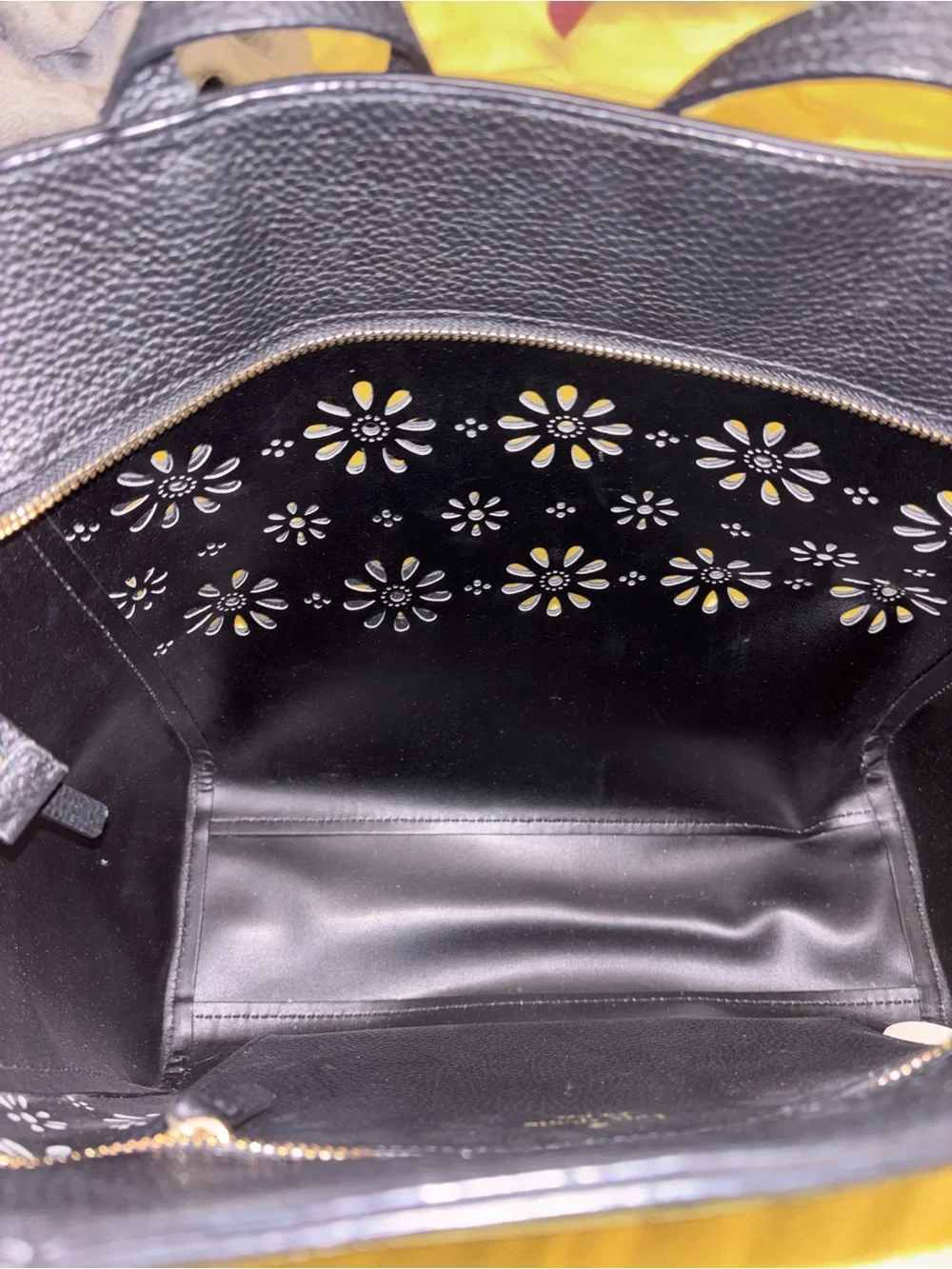 kate spade black leather tote with floral cutouts